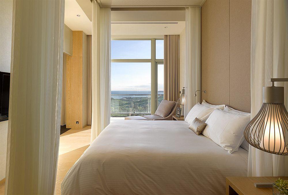 กลอเรีย แมเนอร์ Hotel เขิ่นติง ภายนอก รูปภาพ